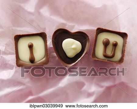 Stock Photo - "Chocolates forming the words """"I love U""""". Fotosearch