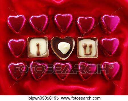 "Chocolates forming the words """"I love U""""" View Large Photo Image Stock Photography - "Chocolates forming the words """"I love U""""". Fotosearch