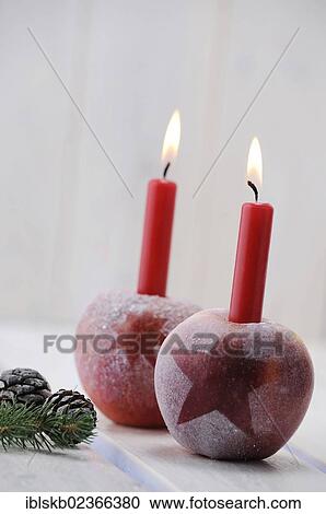 Christmas ambience with red apples and candles View Large Photo Image Stock Image - Christmas ambience with red apples and candles. Fotosearch