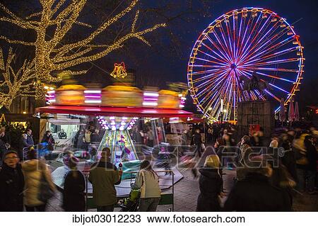 "Christmas fair, ferris wheel and carousel on Burgplatz square, Kettwiger Strasse, pedestrian area in the centre of Essen, Essen, North Rhine-Westphalia, Germany, Europe" View Large Photo Image Stock Image - "Christmas fair, ferris wheel and carousel on Burgplatz square, Kettwiger Strasse, pedestrian area in the centre of Essen, Essen, North Rhine-Westphalia, Germany, Europe". Fotosearch