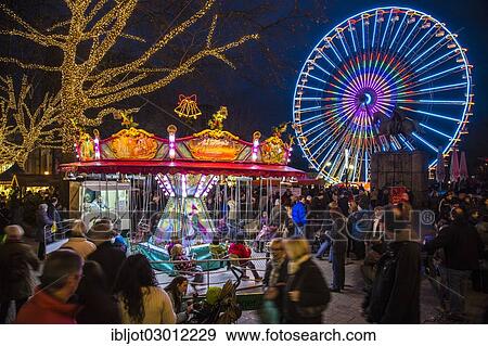 "Christmas fair, ferris wheel and carousel on Burgplatz square, Kettwiger Strasse, pedestrian area in the centre of Essen, Essen, North Rhine-Westphalia, Germany, Europe" View Large Photo Image Stock Photo - "Christmas fair, ferris wheel and carousel on Burgplatz square, Kettwiger Strasse, pedestrian area in the centre of Essen, Essen, North Rhine-Westphalia, Germany, Europe". Fotosearch