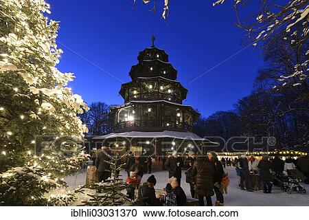 Stock Image - "Christmas market at the Chinese Tower, English Gardens, Munchen, Munich, Upper Bavaria, Bavaria, Germany, Europe". Fotosearch