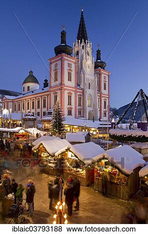 "Christmas market in front of the Mariazell Basilica at the blue hour, main square, Maria Zell, Upper Styria, Styria, Austria, Europe" View Large Photo Image Stock Photo - "Christmas market in front of the Mariazell Basilica at the blue hour, main square, Maria Zell, Upper Styria, Styria, Austria, Europe". Fotosearch