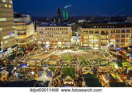 Stock Photo - "Christmas market on Kennedyplatz square, downtown Essen, Essen, North Rhine-Westphalia, Germany, Europe". Fotosearch
