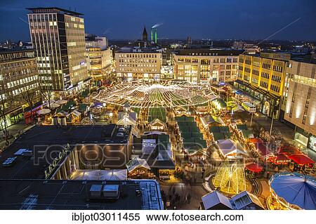 Stock Photography - "Christmas market on Kennedyplatz square, downtown Essen, Essen, North Rhine-Westphalia, Germany, Europe". Fotosearch
