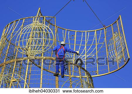 "Christmas tree being constructed, Plaza de la Puerta del Sol, Madrid, Spain, Europe" View Large Photo Image Stock Image - "Christmas tree being constructed, Plaza de la Puerta del Sol, Madrid, Spain, Europe". Fotosearch