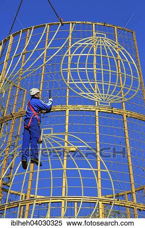 "Christmas tree being constructed, Plaza de la Puerta del Sol, Madrid, Spain, Europe" View Large Photo Image Stock Photography - "Christmas tree being constructed, Plaza de la Puerta del Sol, Madrid, Spain, Europe". Fotosearch