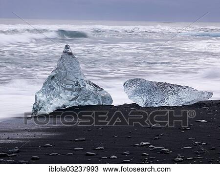 "Chunks of ice lying on the black sandy lava beach on the edge of the Vatnajokull Glacier, Skaftafell National Park, Sudost-Island, Iceland, Europe" View Large Photo Image Stock Image - "Chunks of ice lying on the black sandy lava beach on the edge of the Vatnajokull Glacier, Skaftafell National Park, Sudost-Island, Iceland, Europe". Fotosearch
