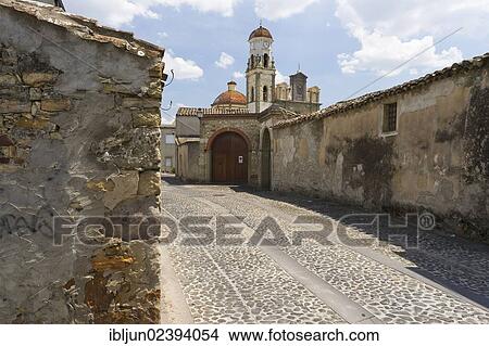 Picture - "Church and lane in Sanluri, Medio Campidano, Province of Cagliari, Sardinia, Italy, Europe". Fotosearch