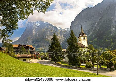 "Church and old village of Grindelwald in summer, Bernese Alps, Switzerland, Europe" View Large Photo Image Stock Photograph - "Church and old village of Grindelwald in summer, Bernese Alps, Switzerland, Europe". Fotosearch