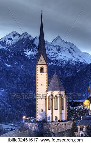 "Church in Heiligenblut on Grossglockner Mountain, Spittal an der Drau, Carinthia, Austria, Europe" View Large Photo Image Stock Photo - "Church in Heiligenblut on Grossglockner Mountain, Spittal an der Drau, Carinthia, Austria, Europe". Fotosearch