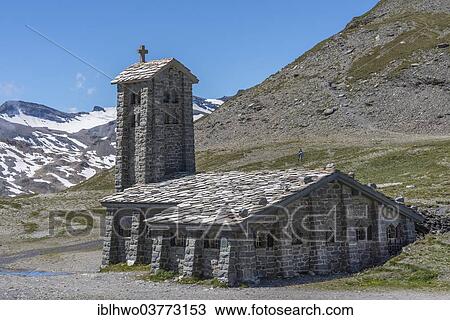 Stock Image - "Church made of natural stone at Col de lâ€™Iseran mountain pass, 2764 m, on the Route des Grandes Alpes mountain road, Val d'Isere, Rhone-Alpes region, France, Europe". Fotosearch