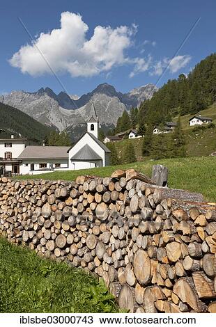 "Church of S-charl, near Scuol, woodpile, Val S-charl, S-Charl, Engadin, Unterengadin, Canton of Graubunden, Switzerland, Europe" View Large Photo Image Stock Image - "Church of S-charl, near Scuol, woodpile, Val S-charl, S-Charl, Engadin, Unterengadin, Canton of Graubunden, Switzerland, Europe". Fotosearch