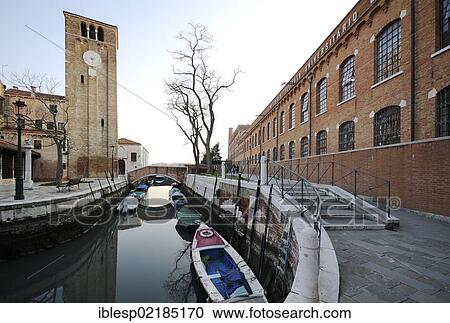 Stock Image - "Church of San Nicolo dei Mendicoli, Iuav University of Venice, boats, canal, Dorsoduro quarter, Venice, Venezia, Veneto, Italy, Europe". Fotosearch