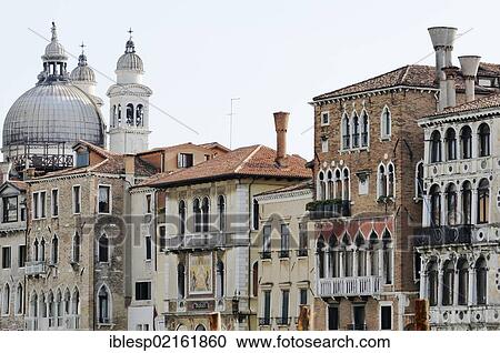 Stock Image - "Church of Santa Maria della Salute, Palazzo Orio Semitecolo palace, Palazzo Salviati palace, Palazzo Barbaro Wolkoff palace, Palazzo Ca' Dario palace, Dorsoduro, Grand Canal, Venice, Veneto, Italy, Europe". Fotosearch