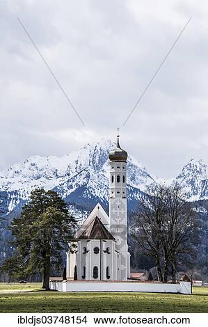 "Church of St. Coloman, in front of the snow-covered Alps, Schwangau, Ostallgau, Allgau, Schwabia, Bavaria, Germany, Europe" View Large Photo Image Picture - "Church of St. Coloman, in front of the snow-covered Alps, Schwangau, Ostallgau, Allgau, Schwabia, Bavaria, Germany, Europe". Fotosearch