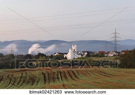 Church of St. Michael built in the early 1990s and power lines of Hochrheinkraftwerke power plant, Karsau, Rheinfelden - Baden, Baden-Wuerttemberg, Germany, Europe View Large Photo Image Stock Image - Church of St. Michael built in the early 1990s and power lines of Hochrheinkraftwerke power plant, Karsau, Rheinfelden - Baden, Baden-Wuerttemberg, Germany, Europe. Fotosearch