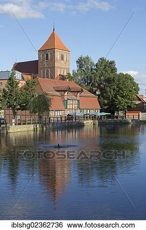 "Church of St. Peter and St. Paul and the Stadtmuehle guesthouse, Teterow, Mecklenburg Switzerland, Mecklenburg-Western Pomerania, Germany, Europe" View Large Photo Image Stock Photograph - "Church of St. Peter and St. Paul and the Stadtmuehle guesthouse, Teterow, Mecklenburg Switzerland, Mecklenburg-Western Pomerania, Germany, Europe". Fotosearch