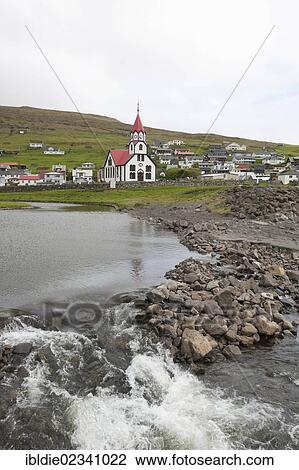 Stock Image - "Church of the community of Sandavagur on Vagar Island, Faroe Islands, North Sea, Northern Europe, Europe". Fotosearch