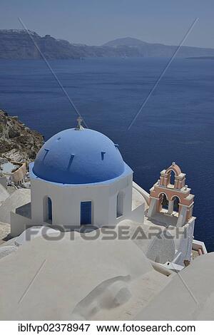 Stock Photo - "Church on the crater rim with views of the Caldera, Oia, Santorini, Cyclades, Greek Islands, Greece, Europe". Fotosearch
