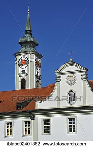 "Church steeple with a tower clock and a sundial, Schaeftlarn Abbey, Schaeftlarn, Bavaria, Germany, Europe" View Large Photo Image Stock Image - "Church steeple with a tower clock and a sundial, Schaeftlarn Abbey, Schaeftlarn, Bavaria, Germany, Europe". Fotosearch