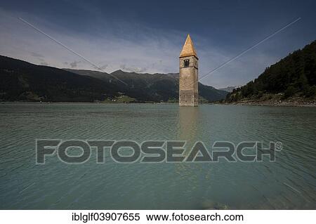 Stock Photography - "Church tower of Alt-Graun in Lake Reschen, Graun, Vinschgau, South Tyrol, Italy, Europe". Fotosearch