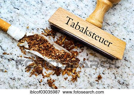 "Cigarette and a stamp labelled """"Tabaksteuer"""", German for """"tobacco tax"""", Germany, Europe" View Large Photo Image Stock Photo - "Cigarette and a stamp labelled """"Tabaksteuer"""", German for """"tobacco tax"""", Germany, Europe". Fotosearch