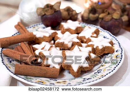 "Cinnamon stars, cinnamon sticks and mangosteen fruits on a plate" View Large Photo Image Stock Image - "Cinnamon stars, cinnamon sticks and mangosteen fruits on a plate". Fotosearch