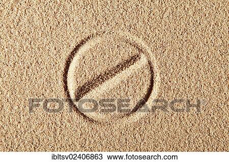 Stock Image - "Circle with a diagonal line, drawn in sand". Fotosearch