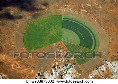 Stock Image - "Circular fields on the Orange River, irrigation of large areas in the Karoo Desert, Gariepdam, Free State Province, South Africa, Africa". Fotosearch