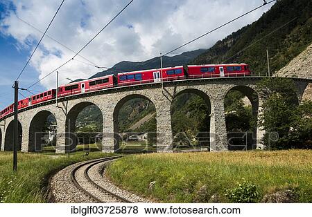 Stock Photo - "Circular viaduct of Brusio, Rhaetian Railway, Bernina Express, Brusio, Canton of Graubunden, Switzerland, Europe". Fotosearch