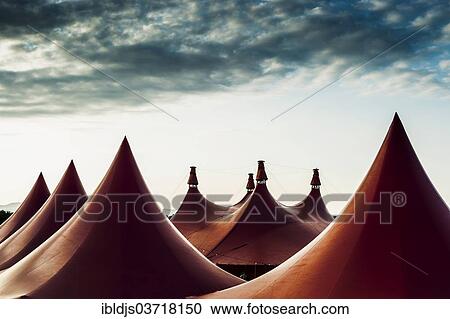 "Circus tents and an evening sky, during the Zelt-Musik-Festival, ZMF 2013, Freiburg im Breisgau, Baden-Wurttemberg, Germany, Europe" View Large Photo Image Stock Image - "Circus tents and an evening sky, during the Zelt-Musik-Festival, ZMF 2013, Freiburg im Breisgau, Baden-Wurttemberg, Germany, Europe". Fotosearch