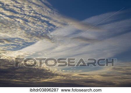 "Cirrus and altocumulus clouds in the evening, Andalusia, Spain, Europe" View Large Photo Image Stock Photo - "Cirrus and altocumulus clouds in the evening, Andalusia, Spain, Europe". Fotosearch