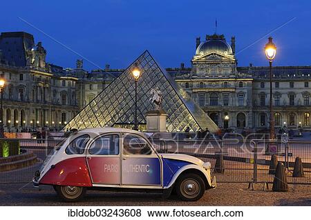 Stock Photo - "Citroen 2 CV parked front of the Musee du Louvre, Louvre Museum, Paris, Ile-de-France, France, Europe". Fotosearch