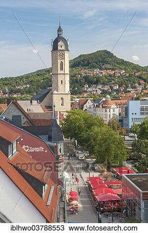 Stock Image - "City center with Church of St. Michael, in the back the Hausberg mountain, Jena, Thuringia, Germany, Europe". Fotosearch