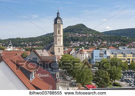 "City center with Church of St. Michael, in the back the Hausberg mountain, Jena, Thuringia, Germany, Europe" View Large Photo Image Stock Photography - "City center with Church of St. Michael, in the back the Hausberg mountain, Jena, Thuringia, Germany, Europe". Fotosearch