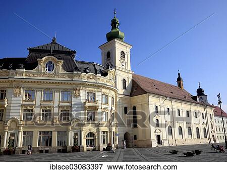 Stock Photo - "City Hall, Catholic Garrison Church, on the Grand Boulevard, Piata Mare, Sibiu, Hermannstadt, Siebenburgen, Romania, Europe". Fotosearch