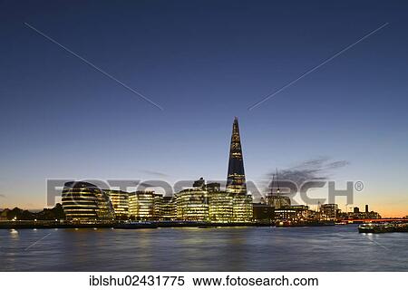 "City Hall, designed by Norman Foster, and The Shard or London Bridge Tower designed by Renzo Piano, at dusk, London, England, United Kingdom, Europe" View Large Photo Image Stock Photography - "City Hall, designed by Norman Foster, and The Shard or London Bridge Tower designed by Renzo Piano, at dusk, London, England, United Kingdom, Europe". Fotosearch