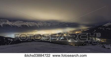 "City of Innsbruck at night, from Mt Jochkreuz, Nordkette or Inn Valley range, Inn Valley, Tyrol, Austria, Europe" View Large Photo Image Stock Image - "City of Innsbruck at night, from Mt Jochkreuz, Nordkette or Inn Valley range, Inn Valley, Tyrol, Austria, Europe". Fotosearch
