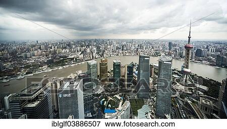 "City panoramic view from Tsing Mao Tower with Oriental Pearl Tower, the office towers of The Bund and the Huangpo River, Shanghai, China, Asia" View Large Photo Image Stock Photo - "City panoramic view from Tsing Mao Tower with Oriental Pearl Tower, the office towers of The Bund and the Huangpo River, Shanghai, China, Asia". Fotosearch