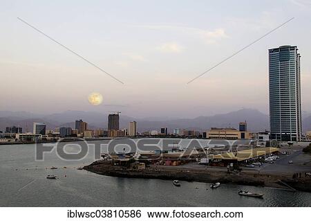 "City view with market halls and skyscrapers, Ras al-Khaimah City, Ras Al Khaimah, United Arab Emirates, Asia" View Large Photo Image Stock Photograph - "City view with market halls and skyscrapers, Ras al-Khaimah City, Ras Al Khaimah, United Arab Emirates, Asia". Fotosearch