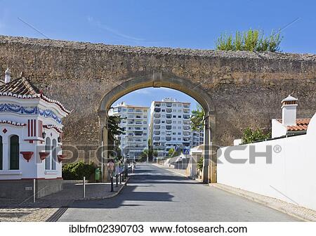 "City wall with an arched gate, Lagos, Algarve, Portugal, Europe" View Large Photo Image Stock Image - "City wall with an arched gate, Lagos, Algarve, Portugal, Europe". Fotosearch