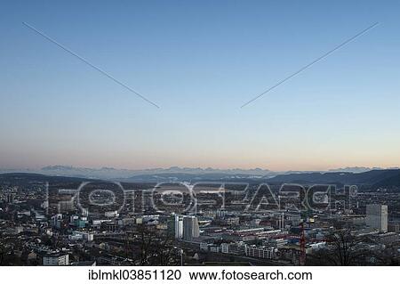 "Cityscape, Lake Zurich at the rear, Swiss Alps on the horizon, Zurich, Switzerland, Europe" View Large Photo Image Stock Image - "Cityscape, Lake Zurich at the rear, Swiss Alps on the horizon, Zurich, Switzerland, Europe". Fotosearch