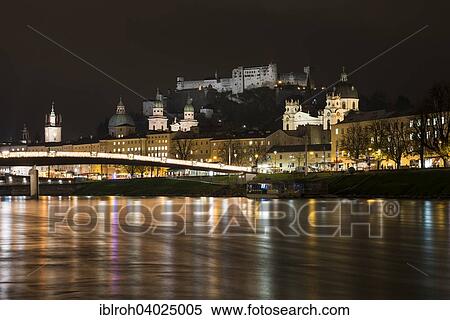 "Cityscape, night view over the Salzach with Hohensalzburg Fortress and Cathedral, Salzburg, Austria, Europe" View Large Photo Image Stock Photography - "Cityscape, night view over the Salzach with Hohensalzburg Fortress and Cathedral, Salzburg, Austria, Europe". Fotosearch