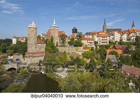 "Cityscape of Bautzen on the Spree river, with the castle's water tower, the Old Waterworks, Ortenburg Castle, St Michael's Church, Water Tower, Saint Peter's Cathedral, and the tower of the Town Hall, from left, Bautzen, Saxony, Germany, Europe" View Large Photo Image Stock Image - "Cityscape of Bautzen on the Spree river, with the castle's water tower, the Old Waterworks, Ortenburg Castle, St Michael's Church, Water Tower, Saint Peter's Cathedral, and the tower of the Town Hall, from left, Bautzen, Saxony, Germany, Europe". Fotosearch