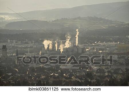 "Cityscape with smoky chimneys, Singen, Baden-Wurttemberg, Germany, Europe" View Large Photo Image Stock Photography - "Cityscape with smoky chimneys, Singen, Baden-Wurttemberg, Germany, Europe". Fotosearch