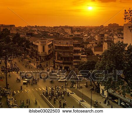 Stock Image - "Cityscape with sunset, Saigon, Ho-Chi-Minh-Stadt, Sudvietnam, Vietnam, Asia". Fotosearch