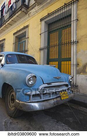 Stock Image - "Classic car parked in the streets of Havana, Havana, Cuba, North America". Fotosearch