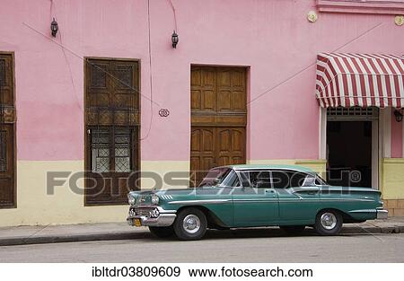 Stock Photo - "Classic car parked in the streets of Havana, Havana, Cuba, North America". Fotosearch