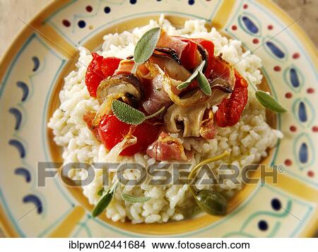 Classic risotto with pesto sauce View Large Photo Image Picture - Classic risotto with pesto sauce. Fotosearch